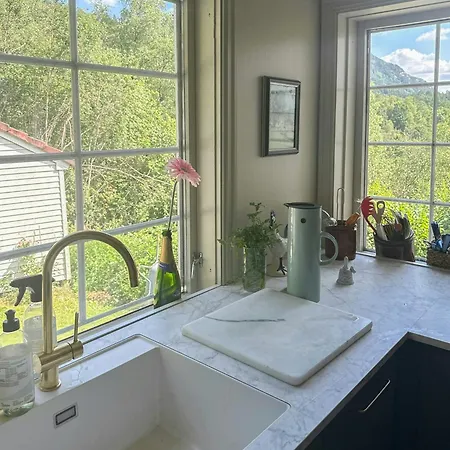 Traditional With Fjord Views In