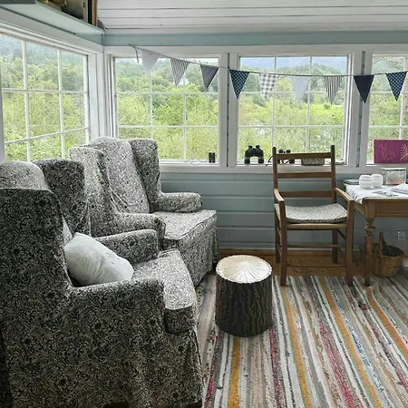 Traditional With Fjord Views In *